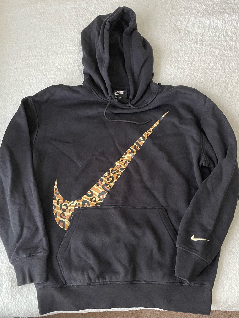 Oversized Nike hoodie with animal print swoosh